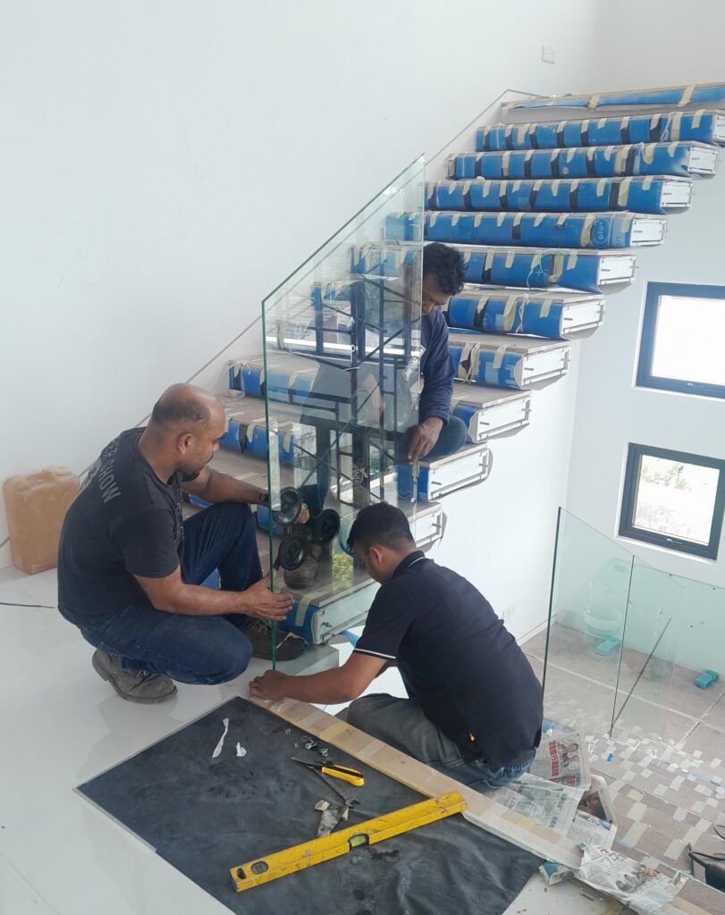 floating marble staircase glass installation